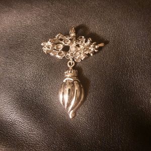 Silver tone Rebecca Collins pendent